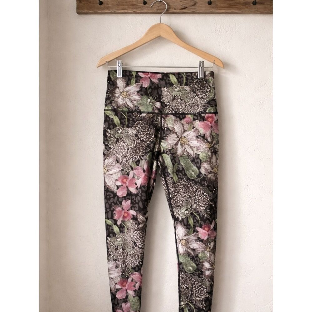 Evolution and Creation Black Leggings with White Floral and Green Accents